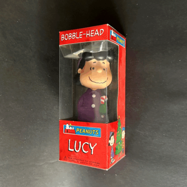 Peanuts LUCY Navidad PVC bobble-head 15cm Funko Wacky Wobbler